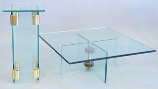 Two piece glass coffee table on glass/wood base, glass with chips along with four panel glass stand, ht. 28 1/2".