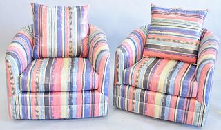 Pair of contemporary armchairs, upholstered in cotton fabric with stripe pattern in pink, blue, green, ht. 26", wd. 31", dp. (seat) 22".