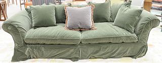 Pair of green velvet sofas with throw pillows, ht. 103".