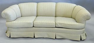 Custom upholstered three-cushion sofa with curved back, 30" h. x 88" w. x 22" d. (seat).