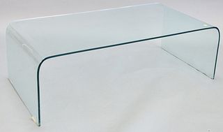 Modern curved glass coffee table, surface scratches, 15" h., top 23 1/2" x 46".