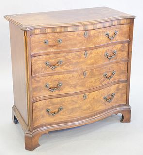 Chippendale style chest, 20th C., having reverse serpentine front with four drawers set on cut out bracket base, 20th C., 33 1/2" h.