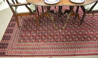 Bokara Oriental Carpet, 6' 7" x 9' 8".