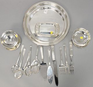 Eighteen pieces of Christofle silverplate, includes three trays, caviar dish, flatware, etc., largest dia. 15 1/2".  [Property from the Collection of 
