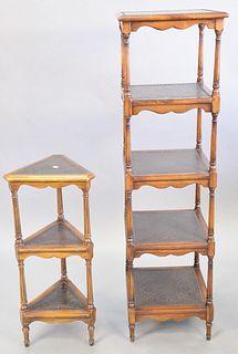 Two contemporary tiered shelves with brass embossed surfaces and stud borders, including: one five tiered, 55" h.; and one three tiered, triangular sh