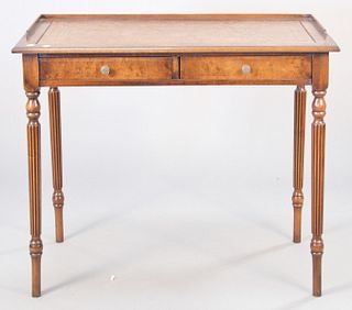 George IV style mahogany table with leather top, two drawers and gallery back and side, 29 1/2" h., top 19" x 36".