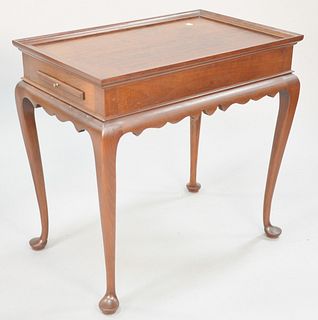 Eldred Wheeler cherry Queen Anne style tea table with candle slides, 27" h., top 18" x 28".