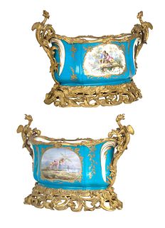 A PAIR OF FRENCH SEVRES PORCELAIN ORMOLU-MOUNTED CACHE-POTS, LATE 19TH CENTURY
