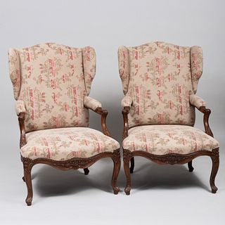 Pair of RÃ¨gence Style Carved Beechwood Wing Chairs