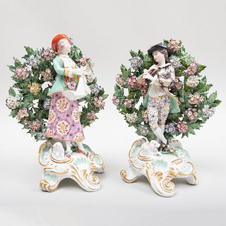 Matched Pair of Chelsea Porcelain Bocage Figures of a Musician and a Flower Seller