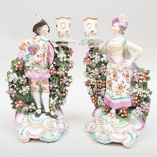 Pair of Chelsea Porcelain Figural Candlesticks of a Gallant and Companion