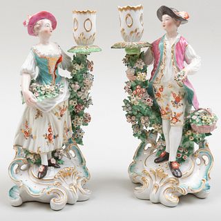 Pair of Chelsea-Derby Porcelain Figural Candlesticks of a Gardener and Companion