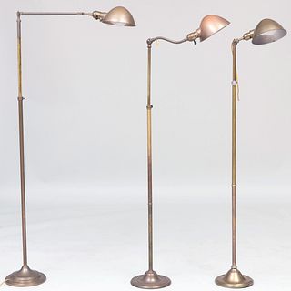 Three Modern Brass Retractable Floor Lamps