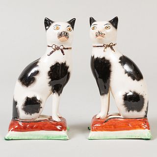 Pair of Staffordshire Pottery Models of Seated Cats