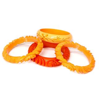 Collection of 4 bakelite/celluloid bangle bracelets