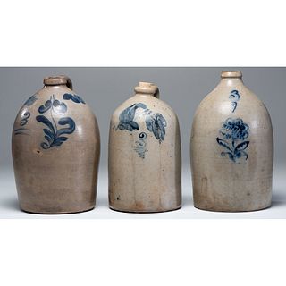 Three Stoneware Jugs with Cobalt Flower Decoration