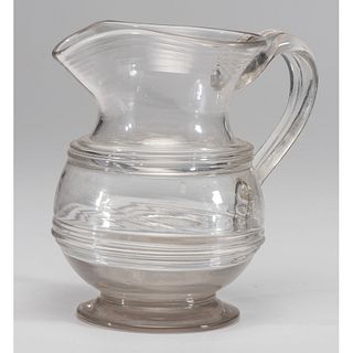A Free Blown Glass Pitcher with Ring Decoration