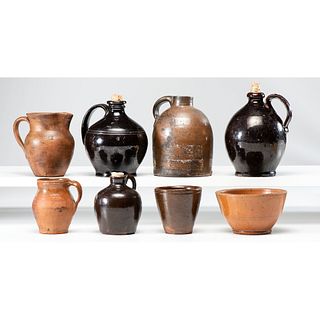 Eight Redware Jugs and Bowls