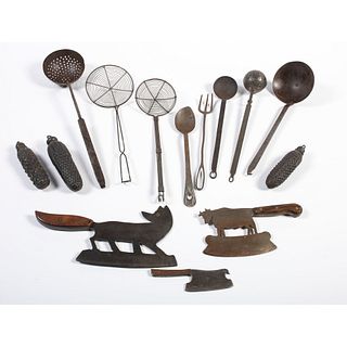 A Group of Iron Kitchen Tools