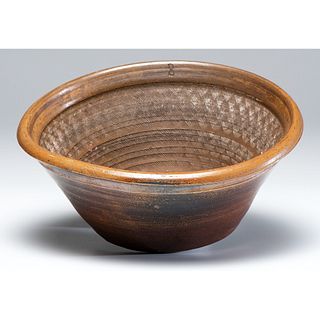 An Incised and Glazed Pottery Bowl