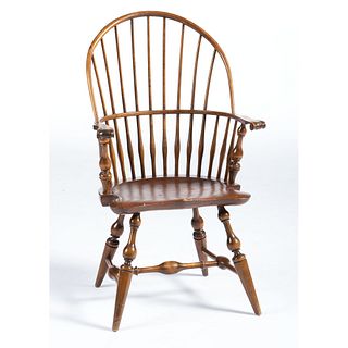 A Wallace Nutting Carved and Turned Sack-Back Windsor Armchair