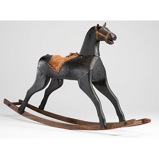 A Painted Wooden Rocking Horse