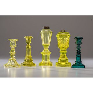 A Group of Molded, Colored Glass Candlesticks and Lamps 