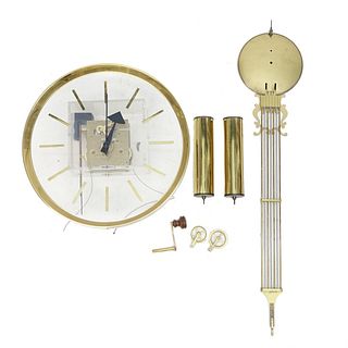 Howard Miller Lucite and Brass Wall Clock
