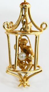 14KT Y GOLD CHARM OF MONKEY IN CAGE