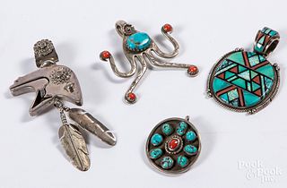 Four Native American Indian pendants