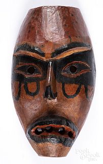 Carved and painted wood tribal mask