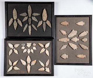 Three frames of prehistoric arrowheads