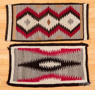 Two Navajo Indian rugs, 41" x 18" and 38" x 20".