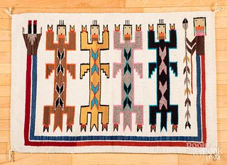 Navajo Yei rug, with five figures, 45" x 32".