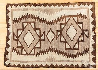 Two Navajo Indian rugs, 55" x 40" and 73" x 49".