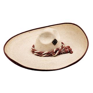 Sombrero Charro. Michoacán, México. Finales del Siglo XX. De palma real con ribete y toquilla de artisela y con chapetas de cuero.