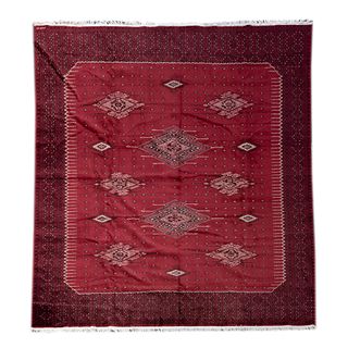 Tapete. México. Siglo XX. Estilo Temoaya. Anudado a mano en fibras de lana. Decorado con elementos geométricos. 266 x 354 cm.