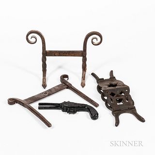 Two Wrought Iron Boot Scrapers and Two Cast Iron Bootjacks