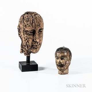 Two Carved Heads
