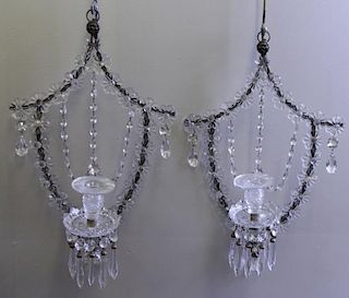 Pair of Cut Crystal Skeleton Form Sconces.