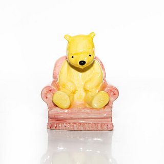 ROYAL DOULTON FIGURINE, WINNIE THE POOH IN THE ARMCHAIR