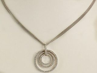 Movado Round Cut Diamond and 18 Karat White Gold Pendant Necklace