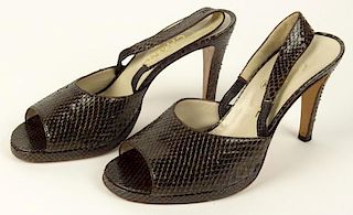 From a Palm Beach Socialite, A Pair of Women's Chanel Dark Brown Snakeskin Sling back Sandals
