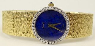 Piaget 18 Karat Yellow Gold Diamond Lady's Flexible Bracelet Watch with Lapis Dial & Brush Matte Bracelet
