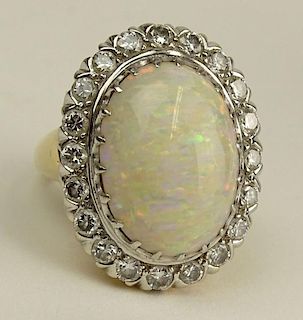 Lady's Vintage White Opal, Round Cut Diamond and 14 Karat Yellow and White Gold Ring