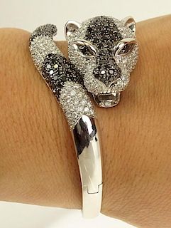 Lady's Cartier style Approx. 10.0 Carat Pave Set White & Black Diamond and 18 karat White Gold Panther Bracelet