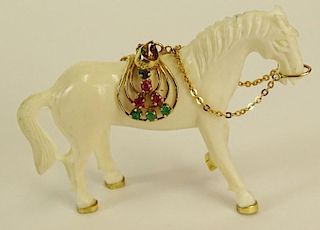 Carved Ivory Horse Pendant with 14 Karat Yellow Gold Saddle with Emerald and Ruby Accents