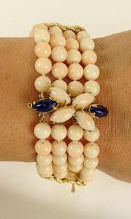 Lady's Vintage Angelskin Coral and 14 Karat Yellow Gold Four Strand Bead Bracelet