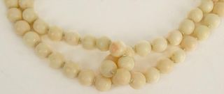 Lady's Vintage Angelskin Coral Bead and 14 Karat Yellow Gold Two Strand Necklace