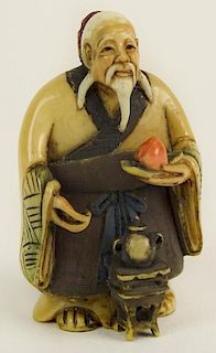 Vintage Japanese Ivory Netsuke. "Man With Apple and Tea"